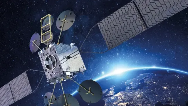 Thales Alenia Space communications satellite with solar arrays above Earth